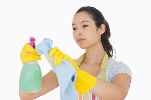 Detailed domestic cleaning in a W9 kitchen and living space