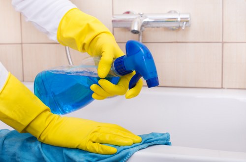 Local cleaning team working in a W9 apartment building